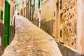 Narrow alley in old mediterranean village Royalty Free Stock Photo