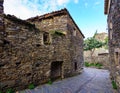 Narrow alley with old stone houses and an atmosphere from another time. Patones de Arriba Madrid Royalty Free Stock Photo