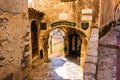 Narrow alley and old stone houses in Eze village in France Royalty Free Stock Photo