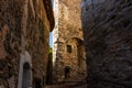 Narrow alley and old stone houses in Eze village in France Royalty Free Stock Photo