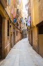Narrow alley in old town Ciutat Vella of Barcelona Royalty Free Stock Photo