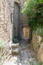 Narrow alley in Oppede le Vieux village in France Royalty Free Stock Photo