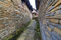 Narrow alley between stone houses