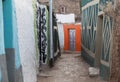 Narrow alleyway in city of Jugol in the morning. Harar. Ethiopia. Royalty Free Stock Photo