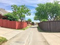 Small back alley at suburban neighborhood in North Dallas, Texa Royalty Free Stock Photo