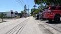 Narrow back road row of cars Royalty Free Stock Photo