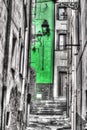 Narrow backstreet in Bosa old town in selective desaturation Royalty Free Stock Photo
