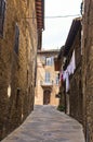 Narrow backstreets with medieval architecture at San Gimignano, Tuscany