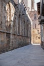 Narrow Barcelona Street with Antique Lamppost in the Gothic Neighborhood of Barcelona, Spain Royalty Free Stock Photo