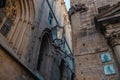 Narrow Barcelona Street with Antique Lamppost in the Gothic Neighborhood of Barcelona, Spain. Royalty Free Stock Photo