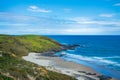 A narrow beach at the bottom of the hills. South Head facing Tasman Sea, Hokianga, Northland, New Zealand Royalty Free Stock Photo