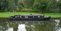 Narrow boat moored on the river Ouse at St Neots Cambridgeshire