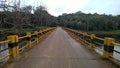 Narrow bridge over a river in India Royalty Free Stock Photo
