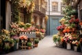 Narrow bystreet with flower shop. Street blossom markers in European style. Ai, AI Generated