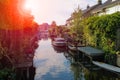 Narrow canal between the buidings. Zwanenburg, the Netherlands