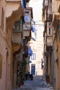 A narrow city street in malta, valletta