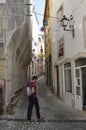 Narrow cobble street in Coimbra Royalty Free Stock Photo