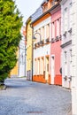 Narrow cobbled ancient street with picturesque colorful houses, Medieval old town of Tabor, Czech Republic Royalty Free Stock Photo