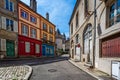 Narrow cobbled street leading to Autun Cathedral in Autun, Burgundy, France