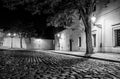 Narrow cobbled street in old medieval town with illuminated houses by vintage street lamps, Novy svet, Prague, Czech Royalty Free Stock Photo