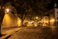 Narrow cobbled street in old medieval town with illuminated houses by vintage street lamps, Novy svet, Prague, Czech Royalty Free Stock Photo