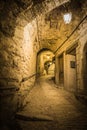 Narrow cobbled street in old town at night, France. Royalty Free Stock Photo