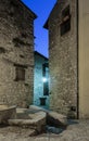 Narrow cobbled street in old town at night, France. Royalty Free Stock Photo