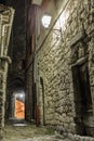 Narrow cobbled street in old town at night, France. Royalty Free Stock Photo