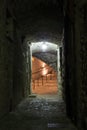 Narrow cobbled street in old town Peille at night, Royalty Free Stock Photo