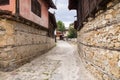 The narrow, cobbled streets of the old Koprivshtitsa in Bulgaria Royalty Free Stock Photo