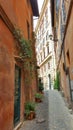 Narrow cobblestone alleyway, Trastevere, Rome, Italy Royalty Free Stock Photo