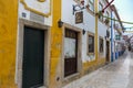 Narrow Colorful Street in the Medieval Portuguese City of Obidos Royalty Free Stock Photo