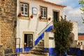 Narrow and colorful streets, facades and balconies of Obidos