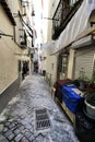 Narrow and colorful streets of Lisbon in a cloudy day Royalty Free Stock Photo