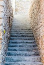 Narrow Concrete Steps Between Stone Walls Royalty Free Stock Photo