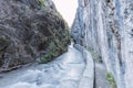 Narrow corridor between mountain walls on the route of the Monachil river, in Los Cahorros, Granada