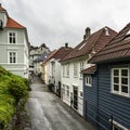 Narrow cozy street in the old town of Bergen with traditional wooden houses, Norway Royalty Free Stock Photo