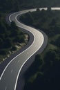 A narrow curvy asphalt road going off in the distance. Generative AI