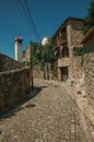 Narrow deserted alley and old houses Royalty Free Stock Photo