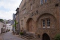 Narrow empty alley passing between old buildings in Ehnen