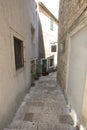 Narrow empty street of medieval town in croatia