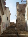 Narrow european street with stairs going up Royalty Free Stock Photo