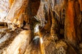 Narrow footpath in a cave in Australia. Royalty Free Stock Photo