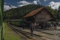 Narrow gauge railway in Majdan station with summer passengers in Poland Royalty Free Stock Photo