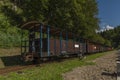 Narrow gauge railway in Majdan station with summer passengers in Poland Royalty Free Stock Photo