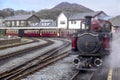 Narrow gauge steam locomotive in the station at porthmadog Royalty Free Stock Photo