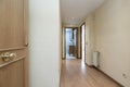 Narrow hallway of a house with a wall covered Royalty Free Stock Photo