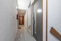 A narrow hallway on the landing of a residential building Royalty Free Stock Photo