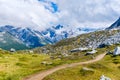 Narrow hiking trail in alpine nature