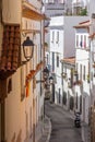 Narrow hilly street, Sitges, Spain Royalty Free Stock Photo